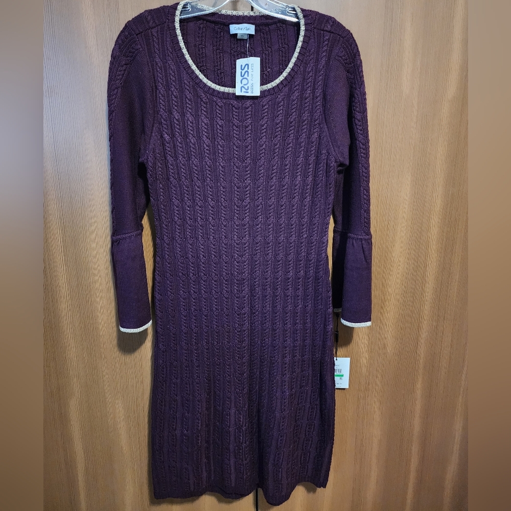 Calvin Klein Dress. New. Size  L. Made in China. Purple. The price was $135.